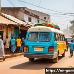 감비아 교통수단 및 대중교통 - A vibrant Gambian city street scene featuring a colorful minibus packed with passengers, bustling ma...